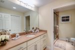 2nd bathroom upstairs features double sinks, shower and toilet and is shared by broom 2 and 3